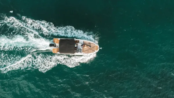 Speed boat sailing with high speed in the ocean